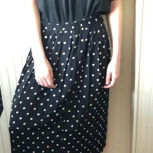 a black and white polka dotted maxi skirt